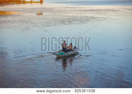Poti, Georgia - 01.09.2019: A Litte Boat And The Fishermen On The Lake In Paliastomi. Poti.