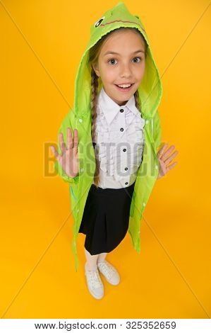 Schoolgirl Hooded Raincoat Going To School. Waterproof Fabric For Your Comfort. Rainproof Accessory.