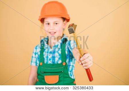Foreman Inspector. Little Girl In Helmet With Hammer. Kid Worker In Hard Hat. Labor Day. 1 May. Repa