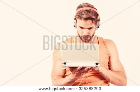 Free Online Music Sources. Cyber Monday Concept. Sexy Muscular Man Listen Audio. Man In Earphones Is