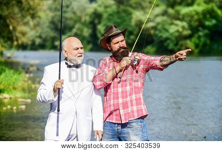 Hobby And Recreation. Family Day. Summer Vacation. Fishing As Holiday. Fisherman In Formal Suit. Suc