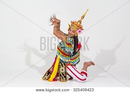 The Beautiful Woman Wearing Thai Southern Folk Dancing Costume,made From Colorful Bead,put Headdress