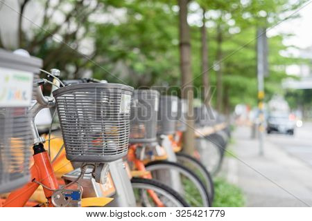 Taipei, Taiwan - May 12th, 2019:row of bicycles called Ubike, a bike sharing system service used by citizens as short-distance transit vehicles in Taipei, Taiwan, Asia