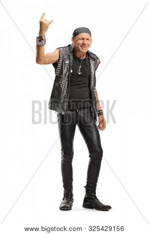 Full length portrait of a punker with a headscarf showing horn sign isolated on white background