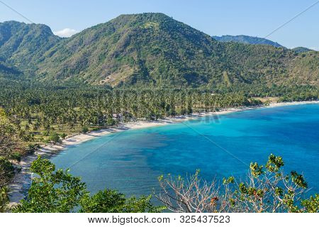 Beautiful landscape of Senggigi beach, Lombok island, scenic travel destination beach with crystal blue waters, Indonesia