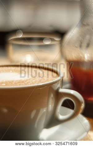 Heart-shaped Cappuccino And Hario V60 Alternative Coffee. Close-up