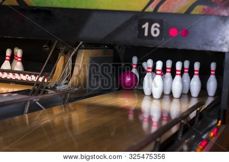 Close Up Of Alley At Bowling Club. Pin Bowling Alley Background. Closeup Of Ten Pin Row On A Lane, N