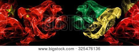China Vs Congo, Congolese Smoke Flags Placed Side By Side. Thick Colored Silky Smoke Flags Of Chines