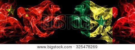 China Vs Senegal, Senegalese Smoke Flags Placed Side By Side. Thick Colored Silky Smoke Flags Of Chi