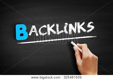 Backlinks Text On Blackboard, Business Concept Background