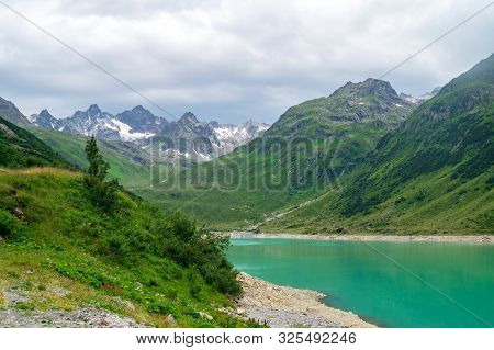 View Of Mountains And Lake Vermunt Along Silvretta High Alpine Road, Austria