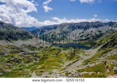 Mountain Landscape And Glacial Bucura Lake In Retezat National Park, Carpathian Mountains, Romania
