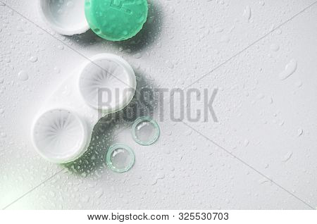 Contact Lenses. Case With Tongs. Poor Vision
