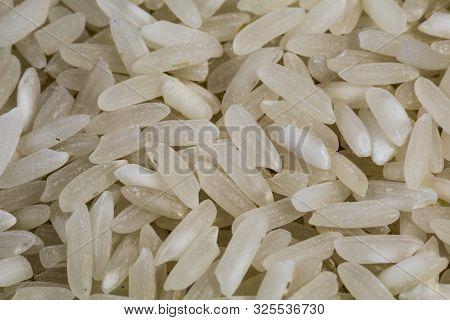 Approach Texture Of Uncooked White Rice Grains