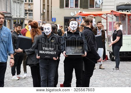 Zurich, Switzerland 09.29.2019: Anonymous For The Voiceless, Members Of The Cube Of Truth Vegan Prot