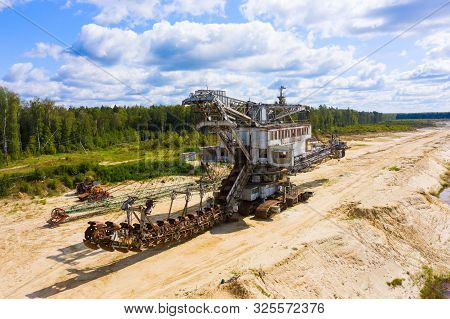 Old Rusty Multi Bucket Excavator, Giant Stacker, Absetzer In Sandy Career.