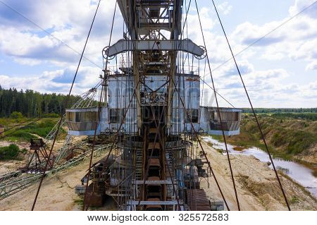 Old Rusty Multi Bucket Excavator, Giant Stacker, Absetzer In Sandy Career.