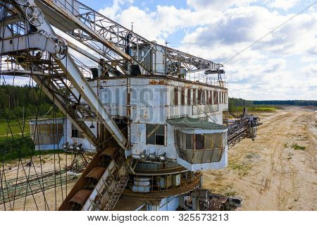 Old Rusty Multi Bucket Excavator, Giant Stacker, Absetzer In Sandy Career.
