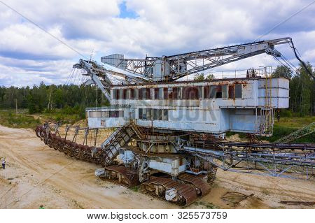 Old Rusty Multi Bucket Excavator, Giant Stacker, Absetzer In Sandy Career.
