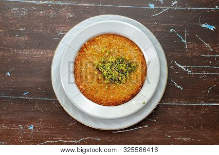 Delicious Traditional Turkish Dessert:  Kunefe  Kadayif With Pistachio And Cheese