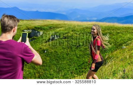 Young Adventurers. Couple Taking Photo. Couple In Love Hiking Mountains. Lets Take Photo. Capturing 
