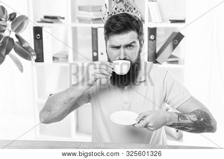 Relaxed Top Manager Drinking Coffee. Confident Boss Enjoying His Glory. King Of Office. Head Of Depa