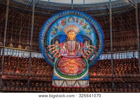 Goddess Durga Idol At Decorated Durga Puja Pandal, Shot At Colored Light, At Kolkata, West Bengal, I