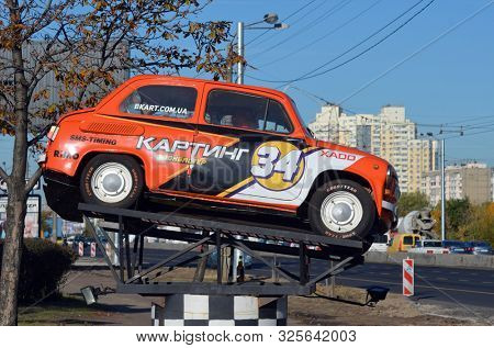 
Old Soviet car ZAZ-965 (Zaporozhets) used as a billboard. October 2, 2019. Kiev, Ukraine