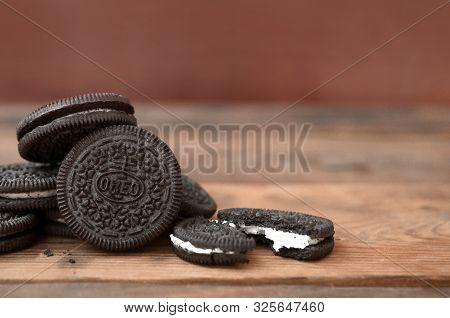 Kharkov, Ukraine - September 8, 2019: Many Oreo Sandwich Cream Biscuits On Wooden Background. Oreo I