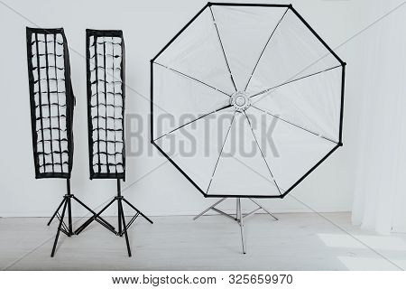Flash On A White Background In The Photo Studio Equipment