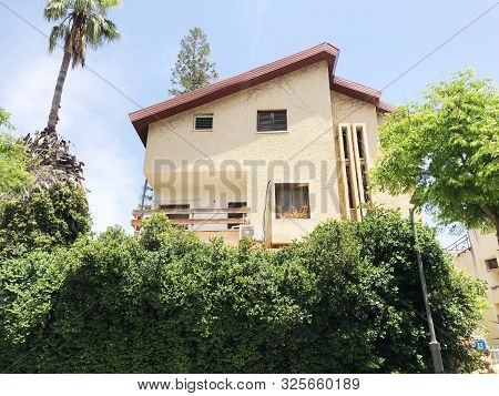 Holon, Israel  April 02, 2019: Private Houses, Trees And Streets In Holon, Israel.
