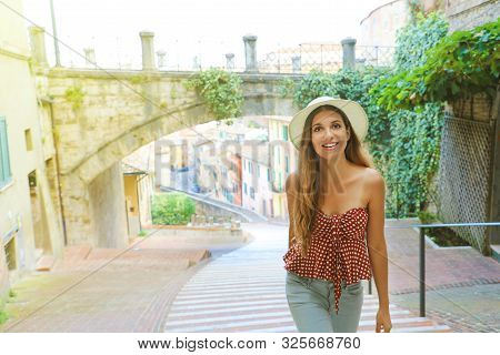 Tourism In Italy. Beautiful Fashion Girl Visiting The Old Medieval Town Of Perugia.