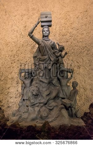 Goddess Durga Idol At Decorated Durga Puja Pandal, Shot At Colored Light, At Kolkata, West Bengal, I