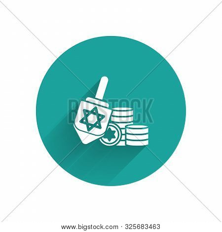 White Hanukkah Dreidel And Coin Icon Isolated With Long Shadow. Green Circle Button. Vector Illustra