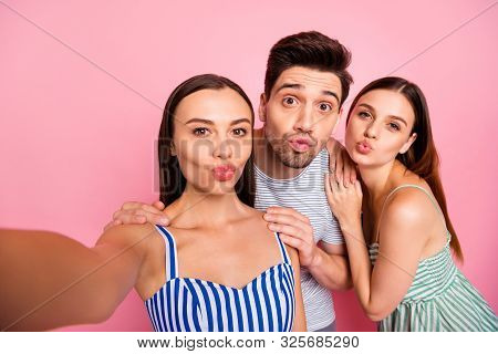 Close Up Photo Of Lovely Youth Making Photos Video Calling Sending Air Kisses Wearing Striped T-shir