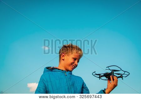 Young Boy Enjoy Playing With Drone In Nature