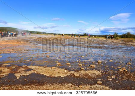 GEYSIR, ICELAND, 14 SEPTEMBER, 2019 : Tourists visiting the famous Geysir area in Iceland, Europe
