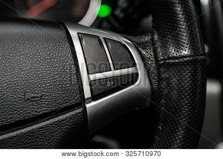 Novosibirsk, Russia - September 11, 2019:  Actyon Ssangyong, Close-up Of The Multiwheel With Phone S