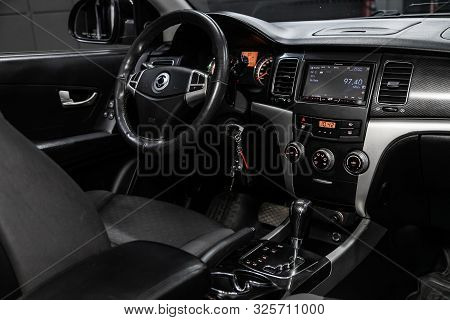 Novosibirsk, Russia - September 11, 2019:  Actyon Ssangyong, Black Luxury Car Interior - Steering Wh