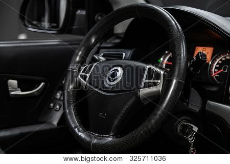 Novosibirsk, Russia - September 11, 2019:  Actyon Ssangyong, Black Luxury Car Interior - Dashboard, 