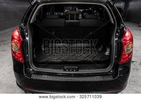 Novosibirsk, Russia - September 11, 2019:  Actyon Ssangyong, Close-up Of The Open Trunk, Headlight, 