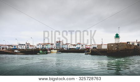 Entrance To The Port Of The Island Of Yeu With Its Semaphore And Typical Small Houses, France