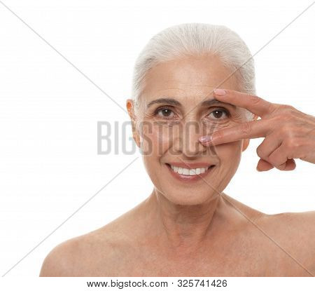 Portrait Of Beautiful Mature Woman On White Background