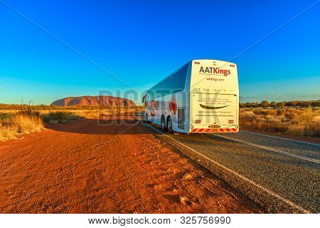 Uluru, Northern Territory, Australia - Aug 25, 2019: Aat Kings Tours And Activities Driving To Ayers