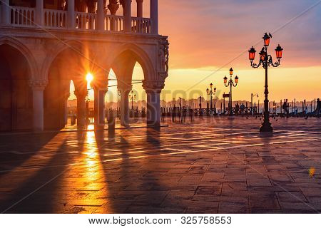 Doge Palace Or Palazzo Ducale And Piazzeta San Marco At Sunrise In Venice, Italy