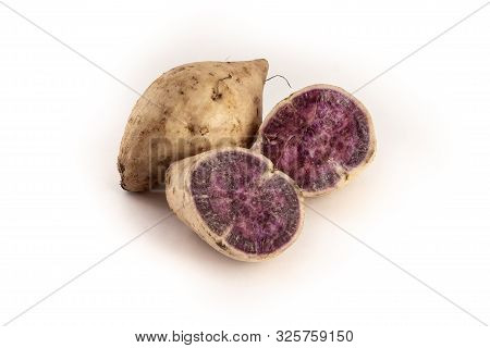 Okinawan Purple Sweet Potatoes On White Background