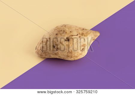 Okinawan Purple Sweet Potatoes On White Background
