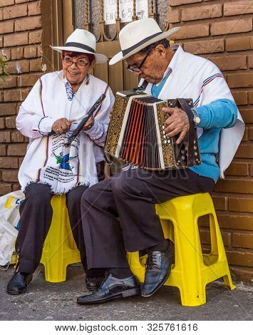 Bogota, Colombia - February 6, 2017 : Musicians playing at Mercado de las Pulgas de Usaquen free market in Bogota capital city of Colombia South America