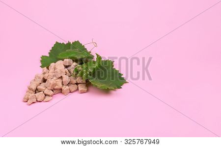 Creative The Sugar Content Of Grapes. Bunch Of Grapes Made Of Sugar On A Pink Background. Mock Up