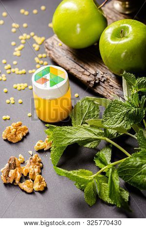 Russia St. Petersburg Greenbox 01102019 Energy Shot, Orange In A Plastic Container, Green Apples, Mi